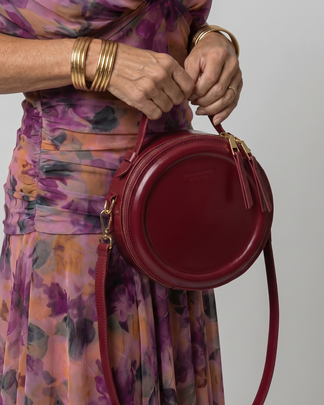 Oriana | Okrągła torba crossbody z zamkiem błyskawicznym
