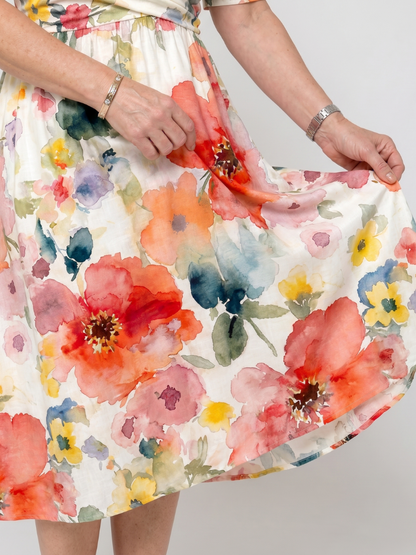 Corinne | Vestido midi estampado floral de manga corta con escote en V