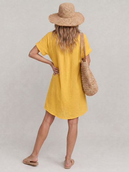 Linon | Vestido de largo midi con bolsillos delanteros y manga corta