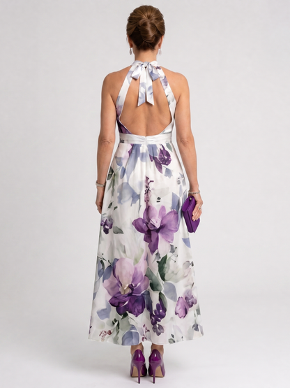 Omego | Vestido midi fluido con cuello halter y estampado floral suave