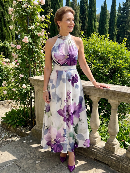 Omego | Vestido midi fluido con cuello halter y estampado floral suave