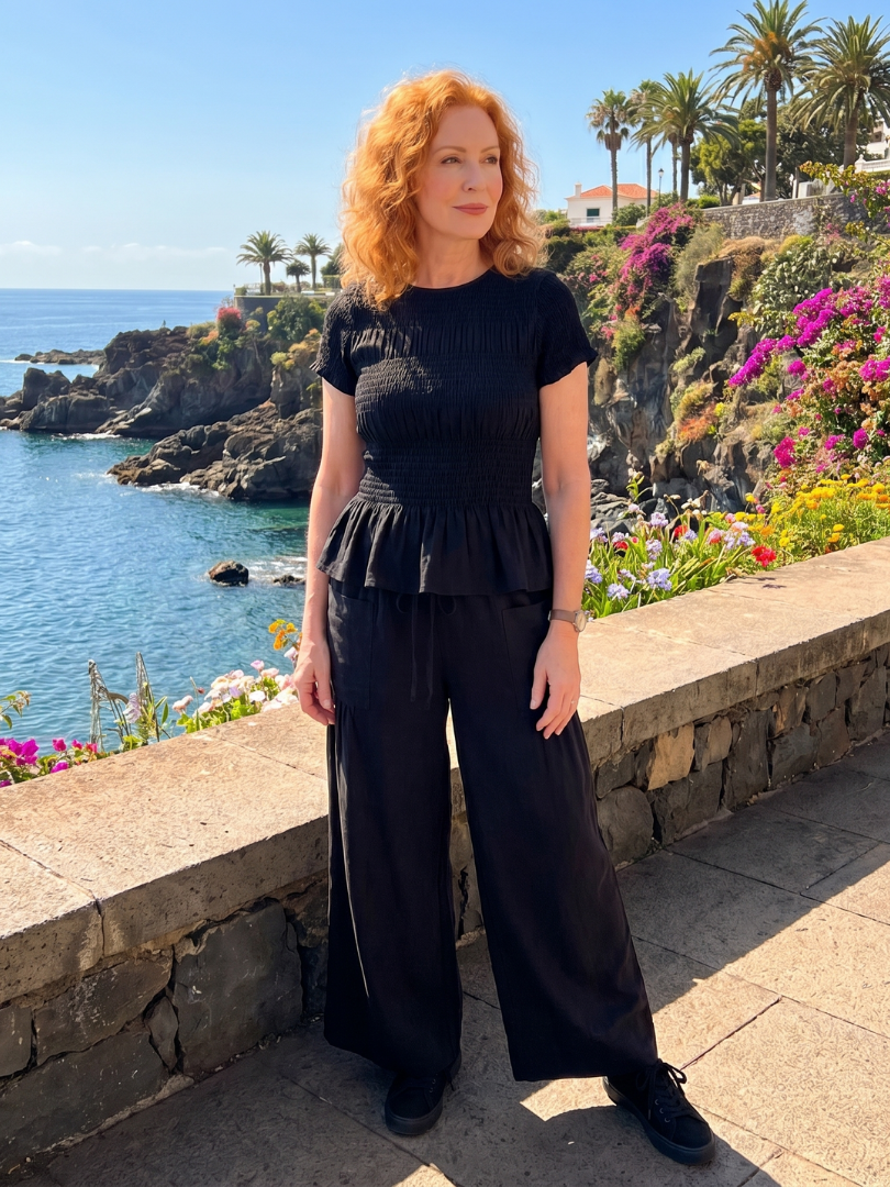 Eirenne | Conjunto de top fruncido con detalle de peplum y pantalones de pierna ancha